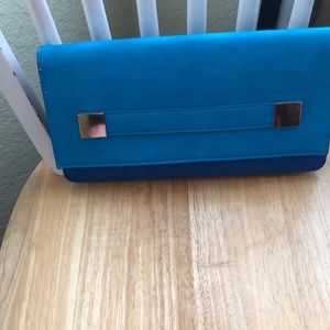 Clutch bag, turquoise leather and blue suede